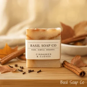Cinnamon & Cloves homemade soap set around cinnamon sticks, cloves and autumn leaves